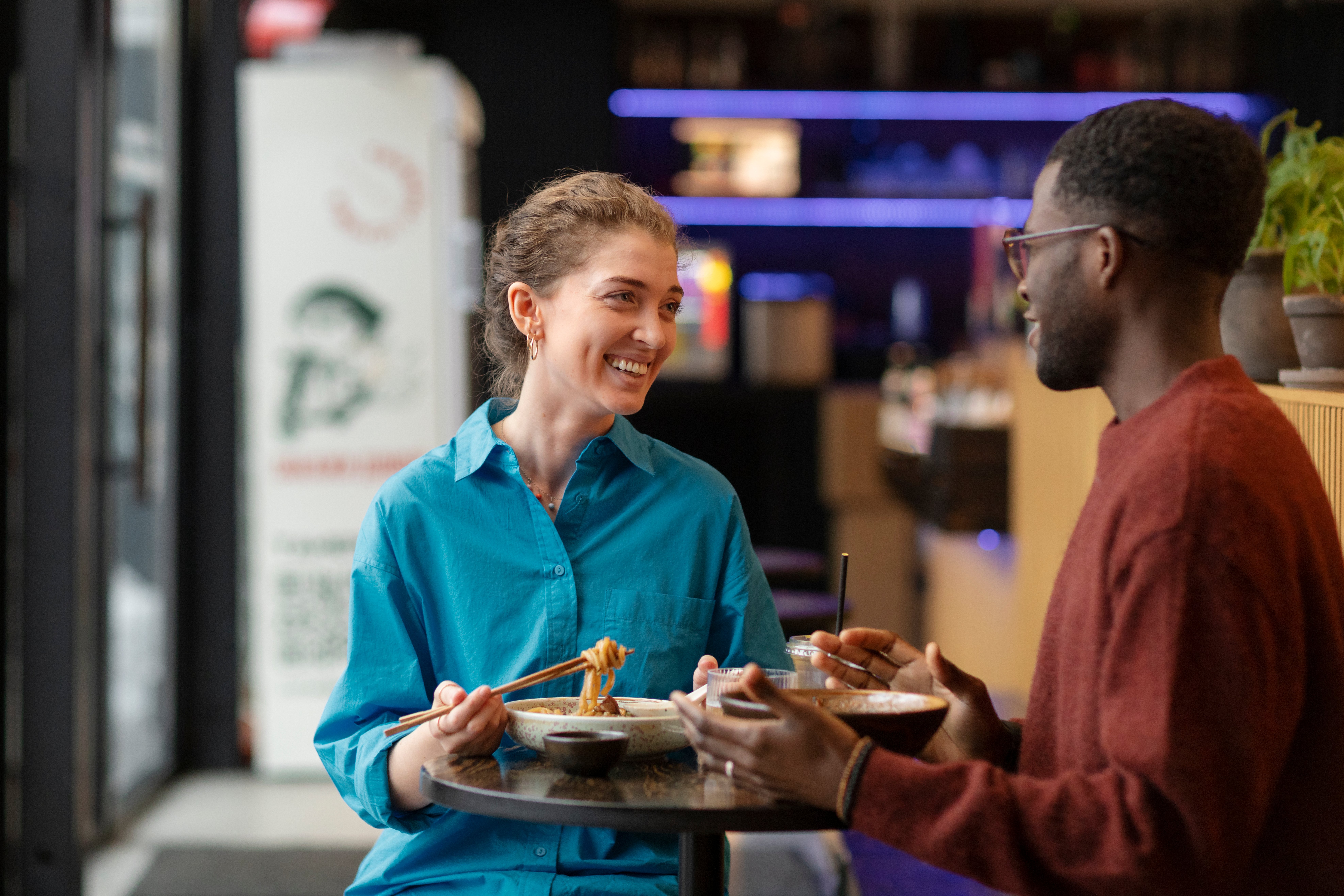 couple-enjoying-food-restaurant